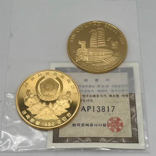Two gold coins sold