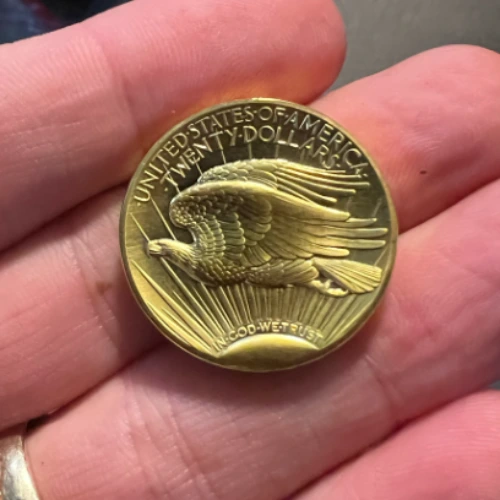 one ounce gold coin sold