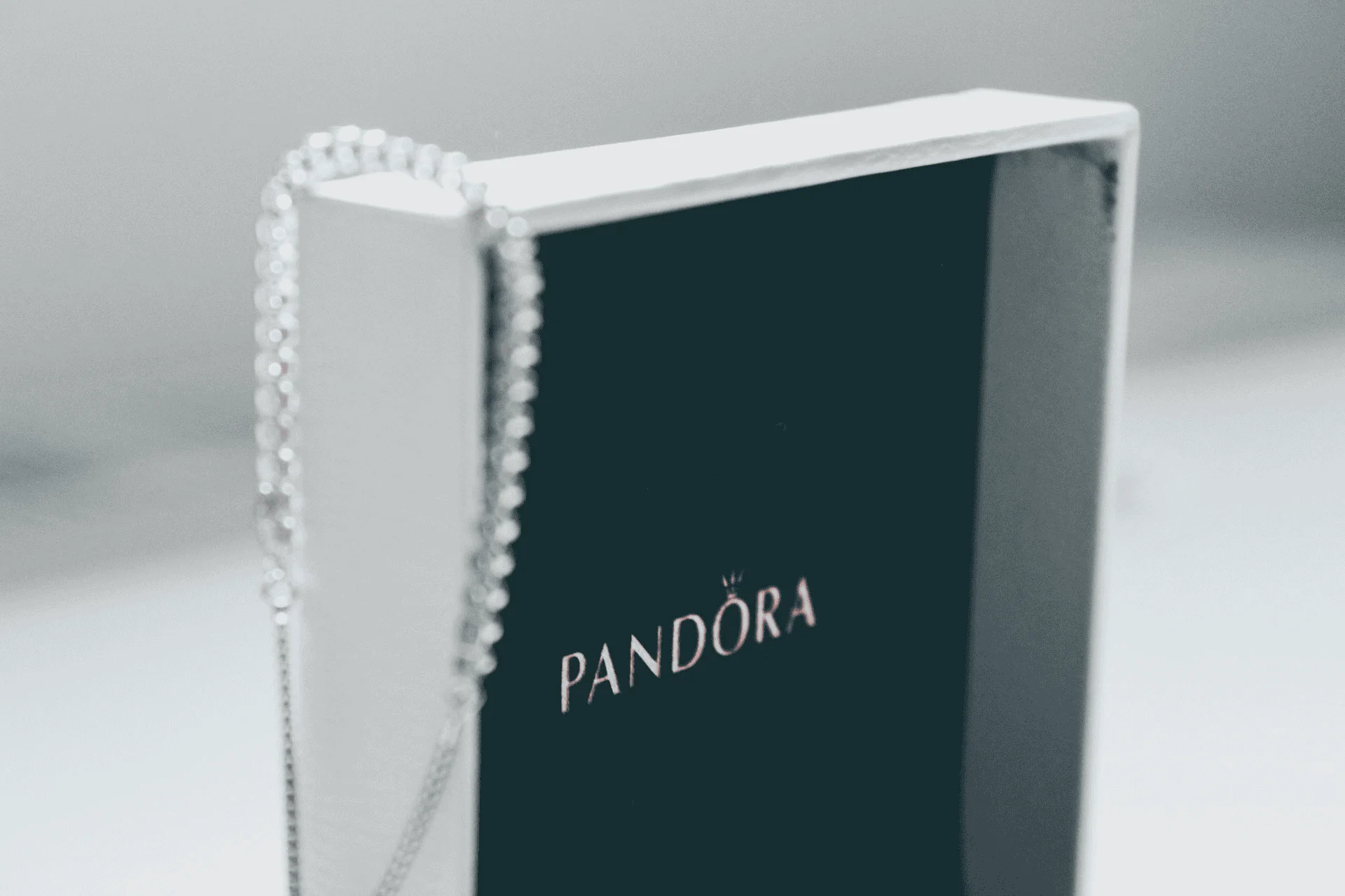 Pandora jewelry's hallmark is ALE for their founder