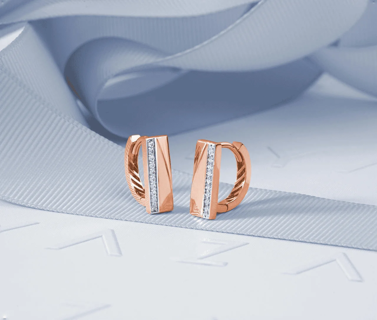 A set of rose gold cuff links
