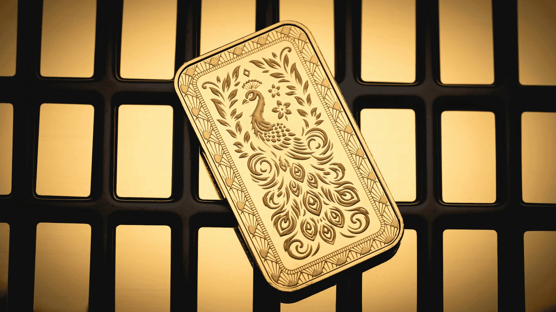 A Scottsdale Mint Gold Peacock 1 oz Bullion Bar