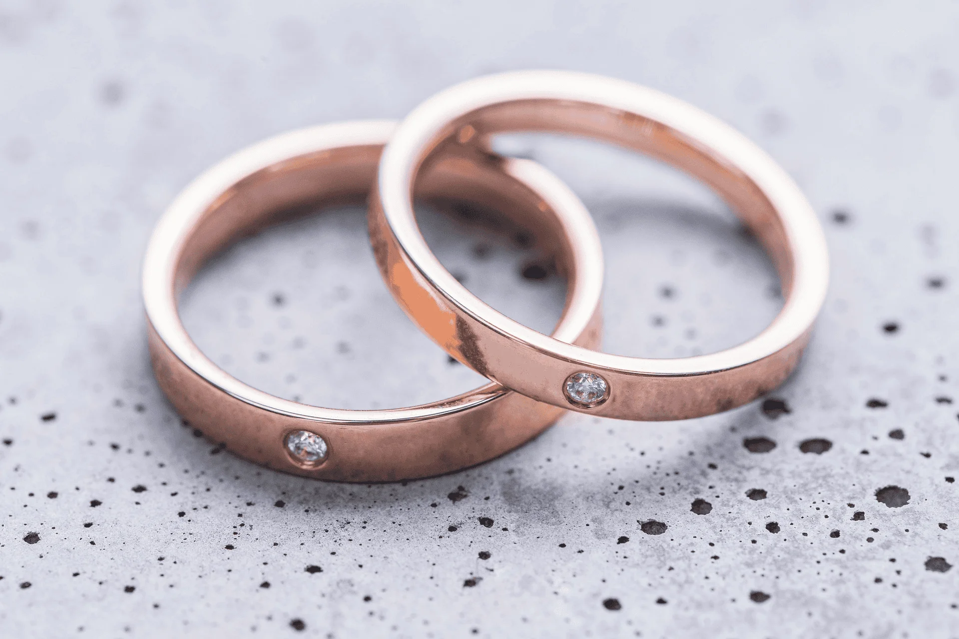 A set of rose gold wedding rings