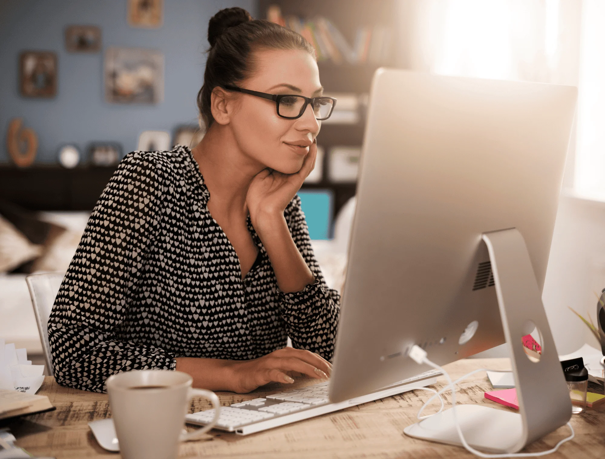 A woman examines the market to determine the price for her resale designer jewelry