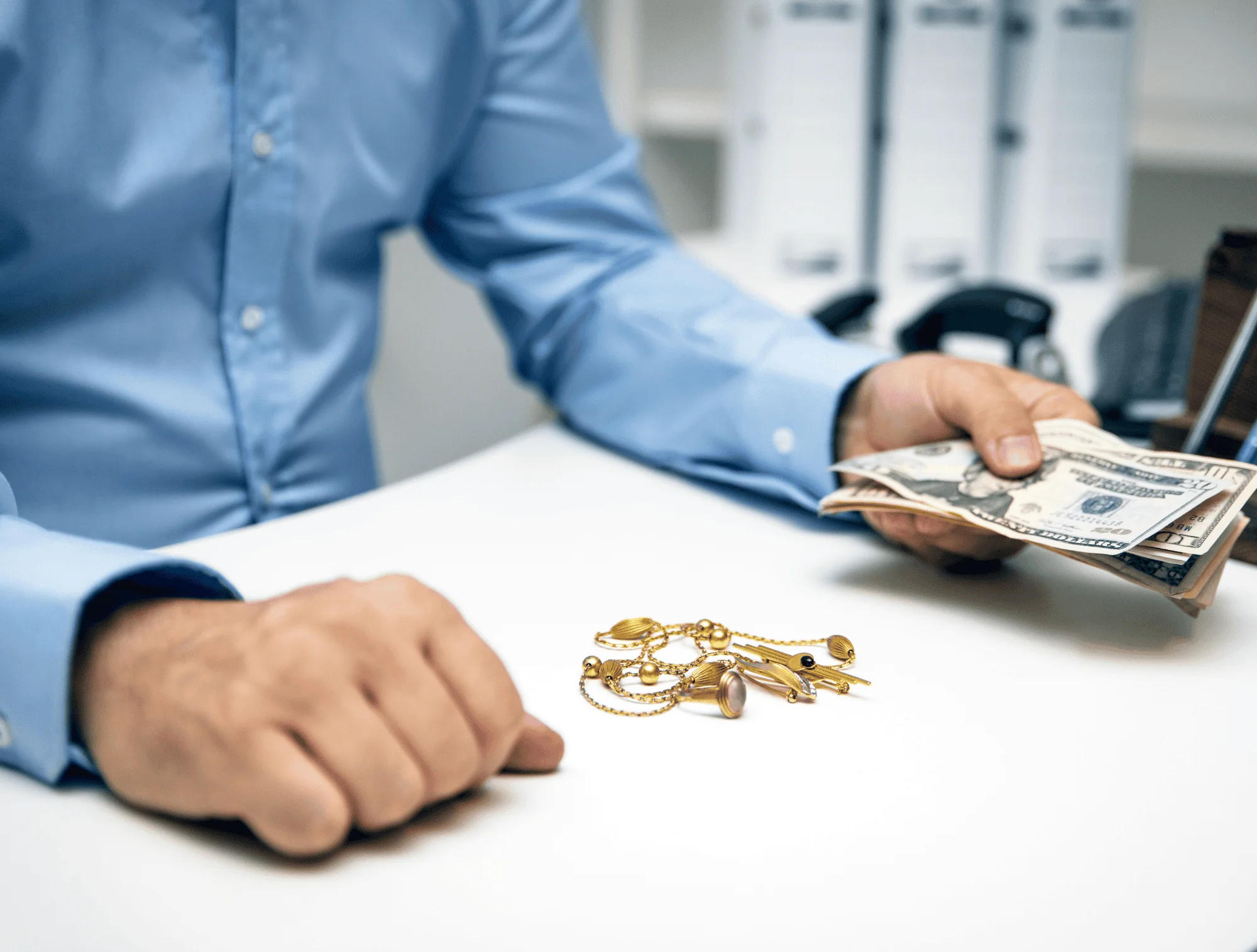 a man pays someone for their gold