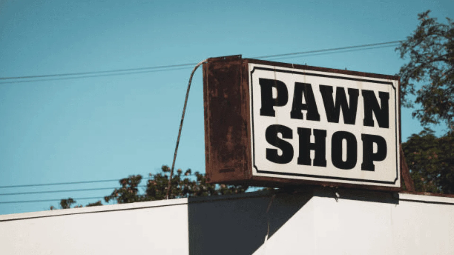 a pawn shop sign over the store