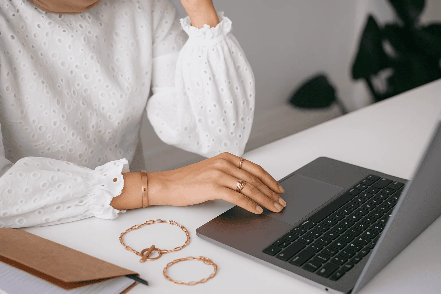 A woman researches fine jewelry resale prices