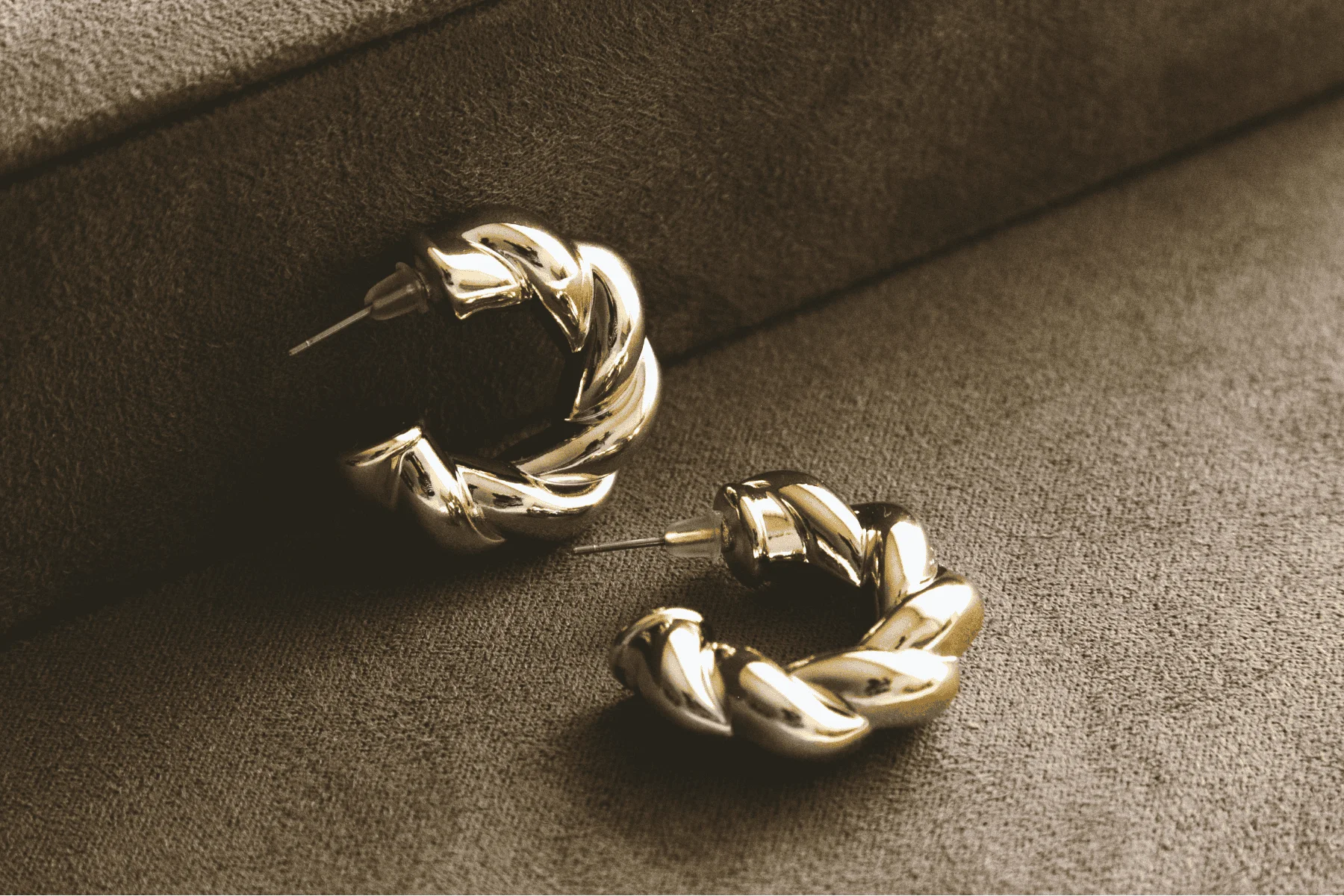 two gold hoop earrings