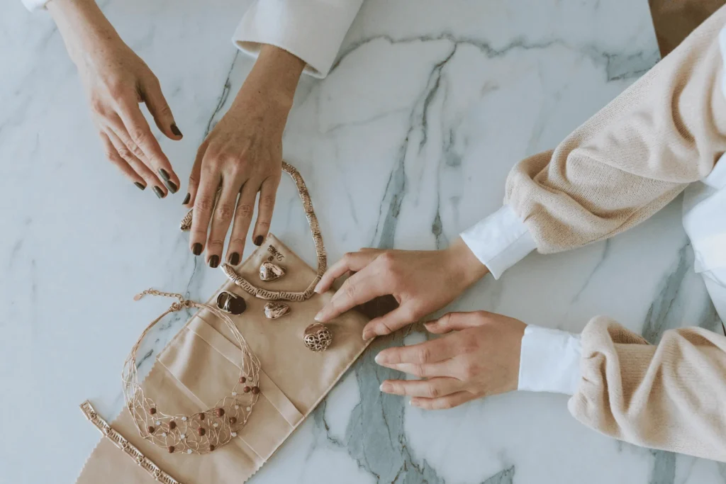 woman looking at jewelry