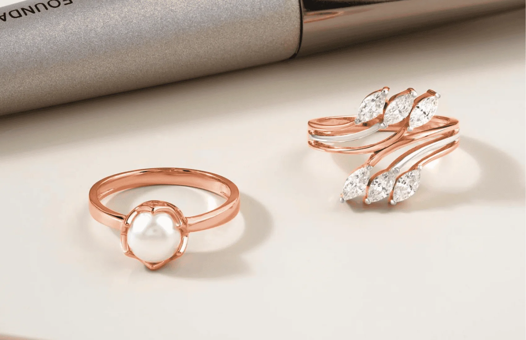 two rose gold rings