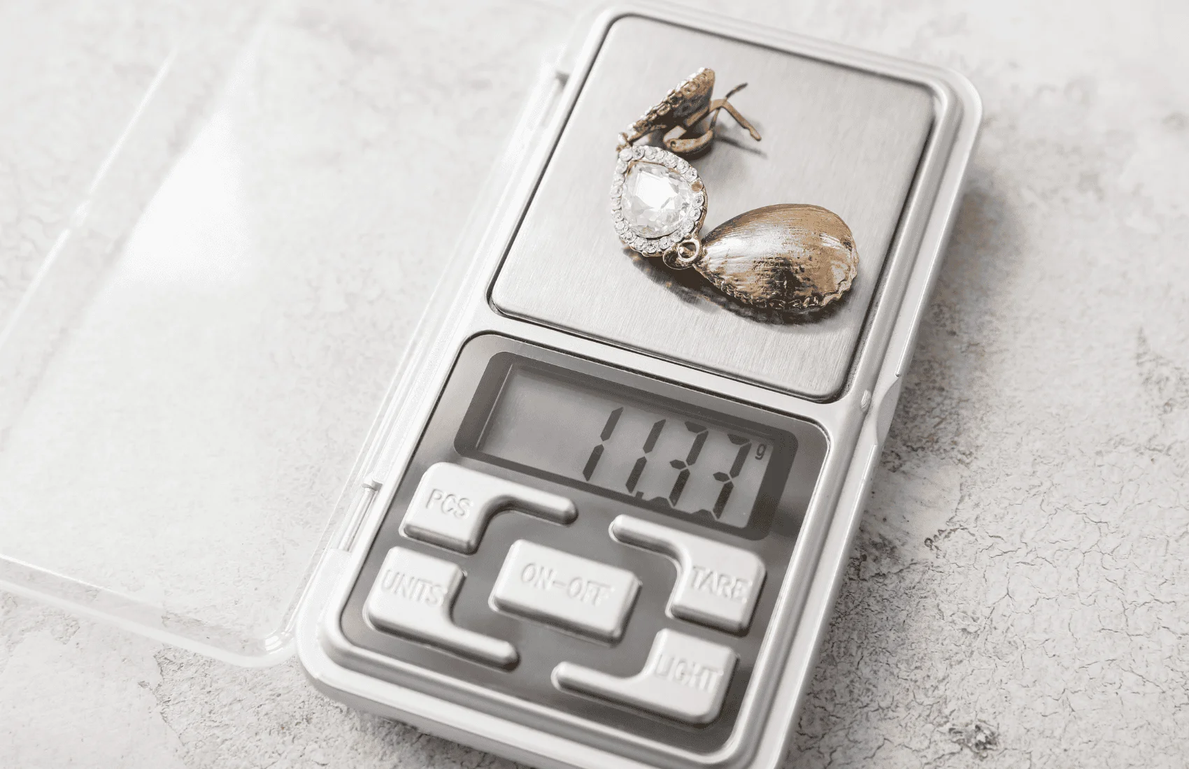 weigh your gold on a scale to calculate the value before selling