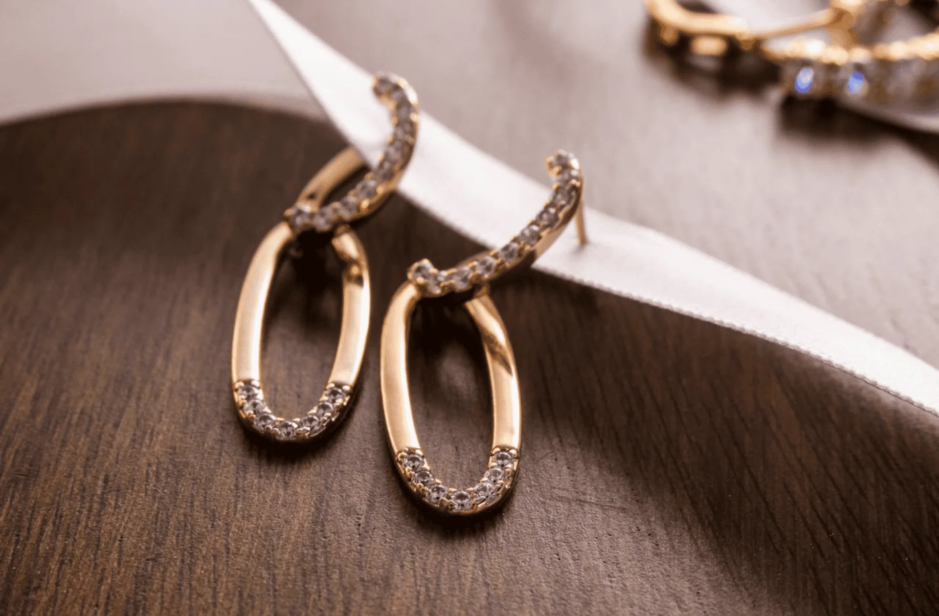 gold hoops with pave diamonds