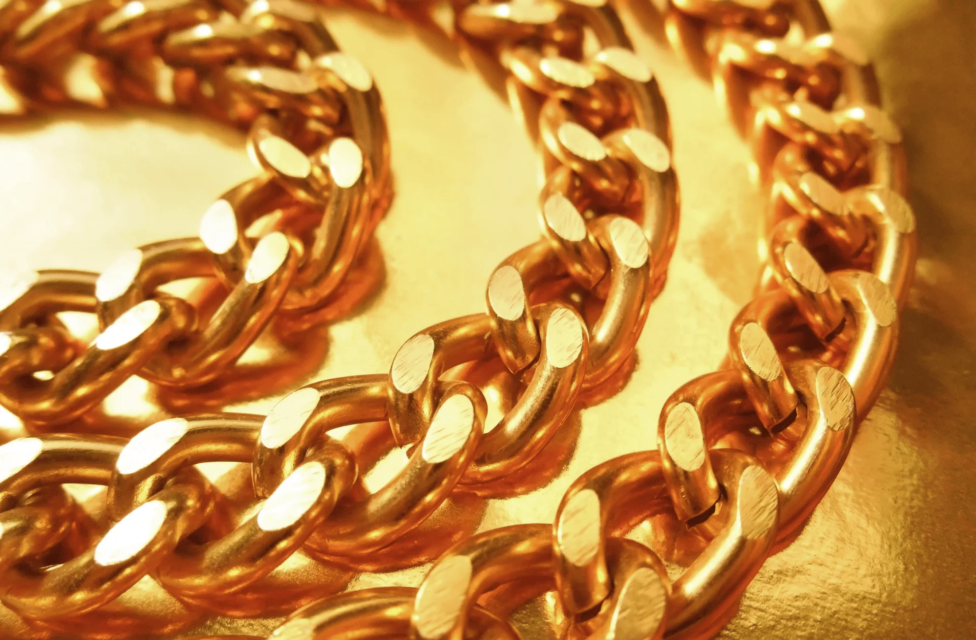 three gold chains