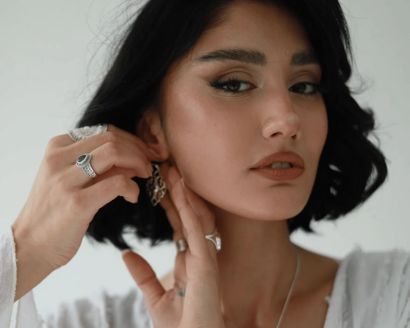 woman with silver jewelry